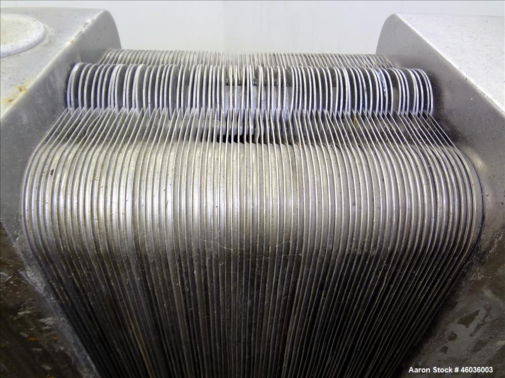 Used De Laval APV Paraflow Plate Heat Exchanger, Type HX, Approxmiate 150 square feet. (70) 9" wide x 36" long 316 Stainless steel plates. (8) 2" Diameter inlets/outlets. No pressure or temperature r...