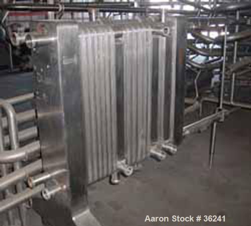 USED:Delaval plate heat exchanger, model P13RC, stainless steel.Approx 190 square feet. (147) 10" wide x 36" long plates. 3 dividerblocks. 59" open rail, 2 screw type tightening bars. (4) 2" cornerin...