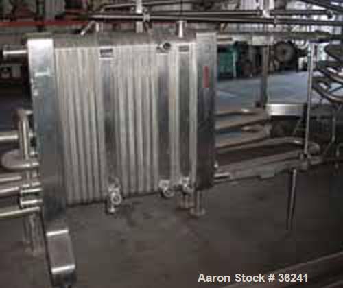 USED:Delaval plate heat exchanger, model P13RC, stainless steel.Approx 190 square feet. (147) 10" wide x 36" long plates. 3 dividerblocks. 59" open rail, 2 screw type tightening bars. (4) 2" cornerin...