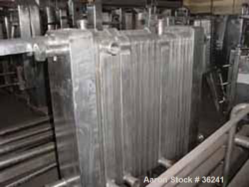 USED:Delaval plate heat exchanger, model P13RC, stainless steel.Approx 190 square feet. (147) 10" wide x 36" long plates. 3 dividerblocks. 59" open rail, 2 screw type tightening bars. (4) 2" cornerin...