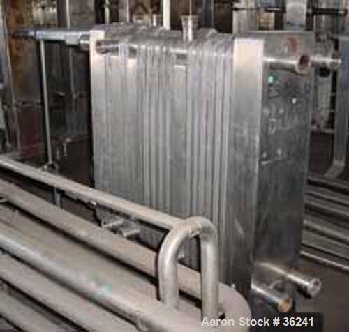 USED:Delaval plate heat exchanger, model P13RC, stainless steel.Approx 190 square feet. (147) 10" wide x 36" long plates. 3 dividerblocks. 59" open rail, 2 screw type tightening bars. (4) 2" cornerin...