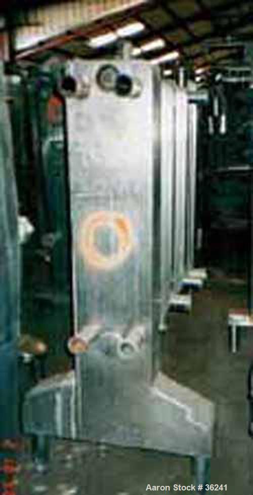 USED:Delaval plate heat exchanger, model P13RC, stainless steel.Approx 190 square feet. (147) 10" wide x 36" long plates. 3 dividerblocks. 59" open rail, 2 screw type tightening bars. (4) 2" cornerin...