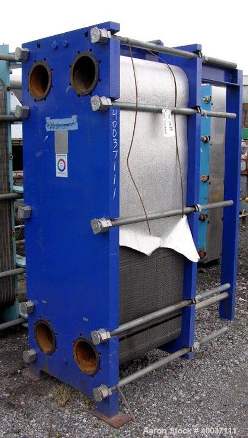 Used Paul Mueller Plate and Frame Heat Exchanger, Model AT-80B-20, 1536 square feet, 304 stainless steel. (172) Approximately 24'' wide x 70'' tall plates. Rated 150 psi at 150 deg F. 6'' inlet/outle...
