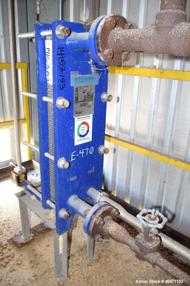 Used- Mueller Plate Heat Exchanger, 32.2 Square Feet, Model AT10 C-20. (28) Approximate 9" wide x 30" long 316 stainless ste...