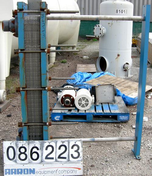Used Mueller Accu-Therm Plate Heat Exchanger, Model AT40 F-20, approximately 202.9 square feet, 304 stainless steel. (42) plates rated 100 psi at 150 degrees F. 3" inlet/outlet. Mounted on a carbon s...