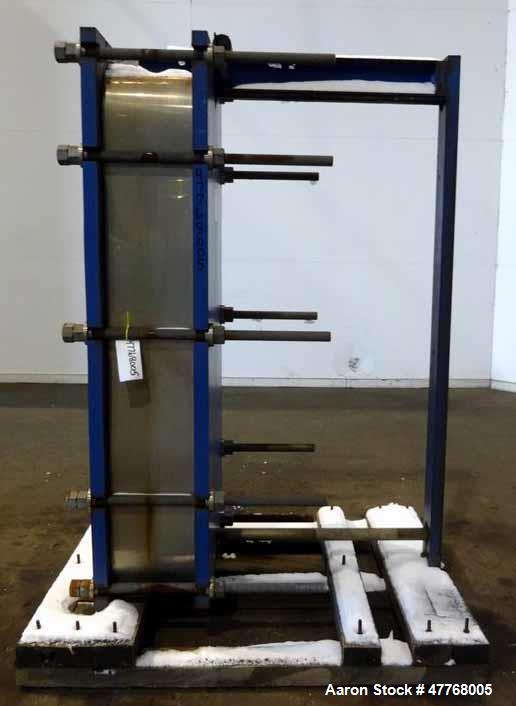 Used Mueller Accu-Therm Plate Heat Exchanger, Approximate 700 Square Feet Surface Area, Model AT80-LB-20. Approximate (82) 316 stainless steel plates rated 80psi at -20 to 300 degrees F. (4) 6-3/4" I...