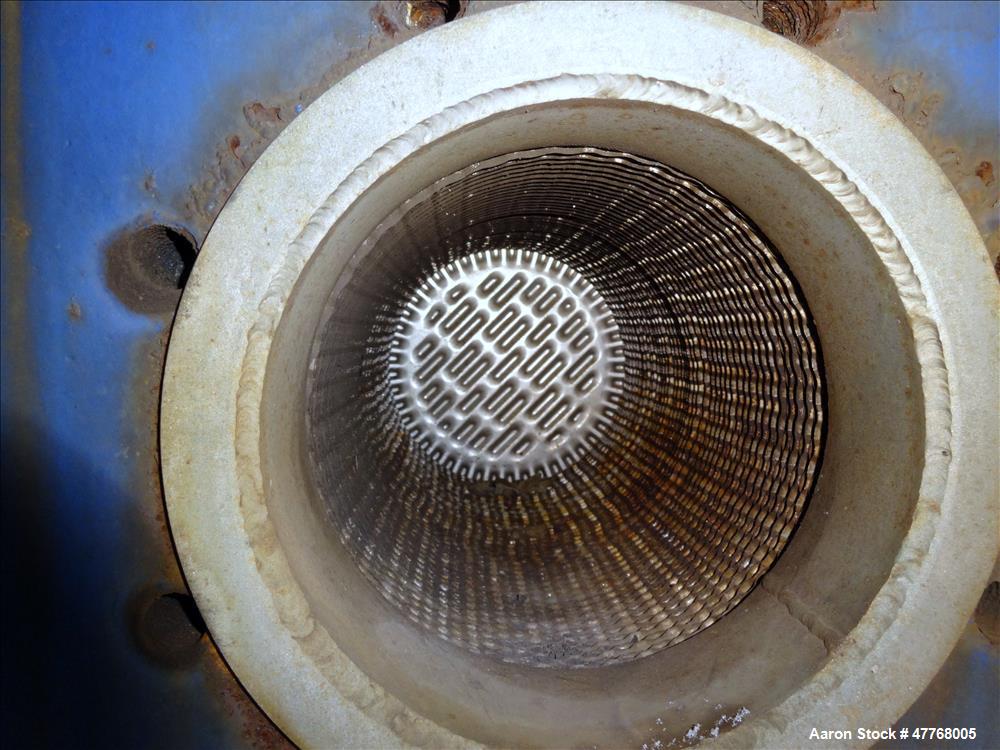 Used Mueller Accu-Therm Plate Heat Exchanger, Approximate 700 Square Feet Surface Area, Model AT80-LB-20. Approximate (82) 316 stainless steel plates rated 80psi at -20 to 300 degrees F. (4) 6-3/4" I...