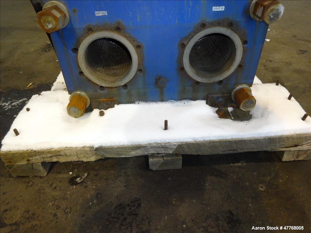 Used Mueller Accu-Therm Plate Heat Exchanger, Approximate 700 Square Feet Surface Area, Model AT80-LB-20. Approximate (82) 316 stainless steel plates rated 80psi at -20 to 300 degrees F. (4) 6-3/4" I...