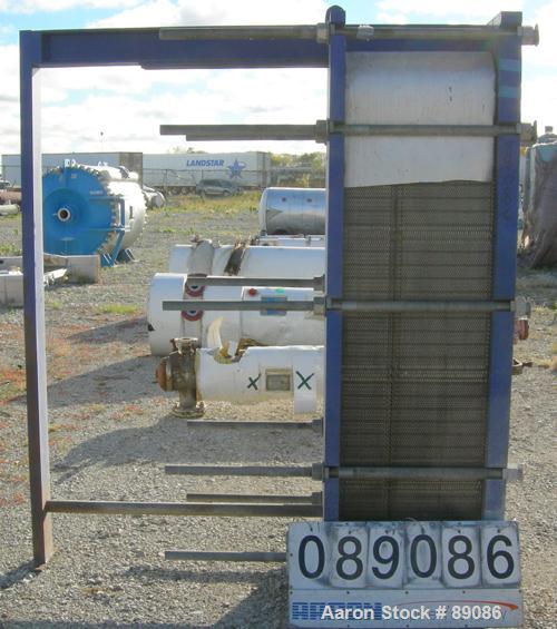 USED: Mueller Accu-Therm plate heat exchanger, model AT80B20, approximately 1220 square feet. (137) 25" wide x 65" tall, 304 stainless steel plates, approximately 9.04 square feet per plate. Expandab...