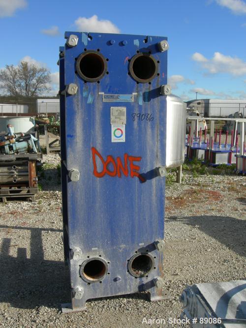 USED: Mueller Accu-Therm plate heat exchanger, model AT80B20, approximately 1220 square feet. (137) 25" wide x 65" tall, 304 stainless steel plates, approximately 9.04 square feet per plate. Expandab...