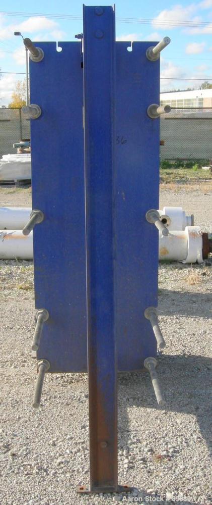 USED: Mueller Accu-Therm plate heat exchanger, model AT80B20, approximately 1220 square feet. (137) 25" wide x 65" tall, 304 stainless steel plates, approximately 9.04 square feet per plate. Expandab...