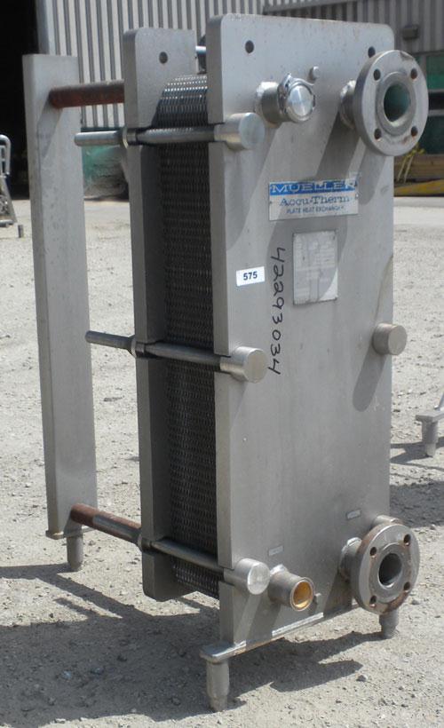 Used Mueller Plate Heat Exchanger, 117.5 Square Feet, Model AT20-SSF-10. (44) 316 Stainless steel plates. Designed for 104 psi at 250 degrees F. 2" sanitary hot inlet/outlet, 2-1/2" cold inlet/outlet...