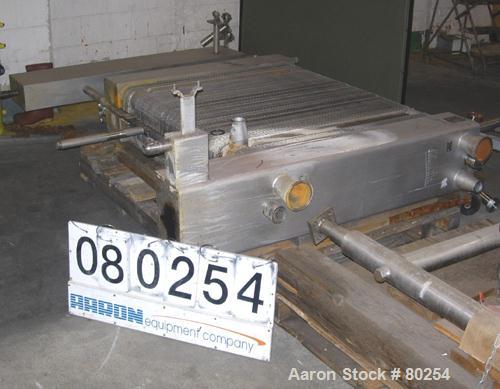 USED: Schmidt plate heat exchanger, 764 sq ft, (240) 11" wide x 42"long 316 stainless steel plates, stainless steel plate ends. 4" inlet/outlet. Sanitary design. Serial #61/36818/06, Sigma 27HW. Rate...