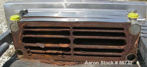 Used St Regis Plate Heat Exchanger Frame Only. 2-1/2" inlet/outlet. Stainless steel clad frame.