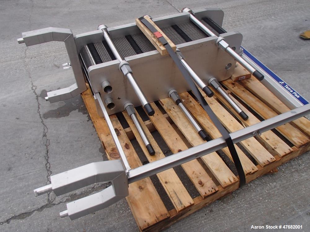 Used Tetra-Pak Plate Heat Exchanger, Model C6-SR/SH. Plates with parallel flow. Design pressure: 300 PSI, liquid volume 12.94 US gallons. Flow rate for hot water: 60gpm. Temp. program for hot water: ...