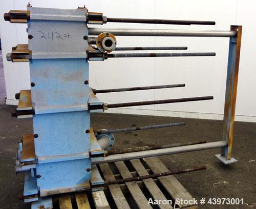 Used Tranter Superchanger Plate Heat Exchanger, Model S-3-HP-76.  250.1 Square feet.  (76) 304 Stainless steel plates. Rated  100 psi at 200 degrees F.  (2) 2-1/2", (2) 4-1/2" inlets/outlets.  Mounte...