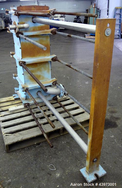 Used Tranter Superchanger Plate Heat Exchanger, Model S-3-HP-76.  250.1 Square feet.  (76) 304 Stainless steel plates. Rated  100 psi at 200 degrees F.  (2) 2-1/2", (2) 4-1/2" inlets/outlets.  Mounte...
