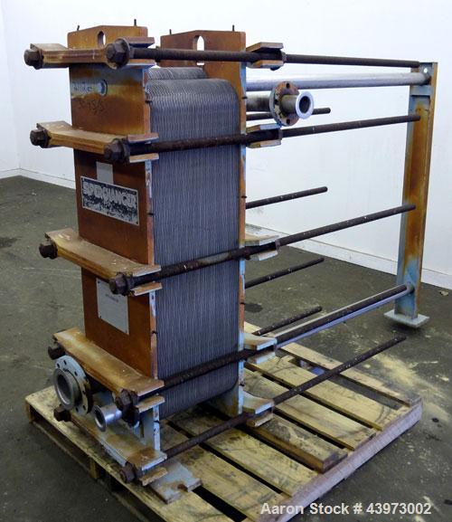 Used Tranter Superchanger Plate Heat Exchanger, Model S-3-HP-76.  250.1 Square feet.  (76) 304 Stainless steel plates.  Rated  100 psi at 200 degrees F.  (2) 2-1/2", (2) 4-1/2" inlets/outlets. Mounte...