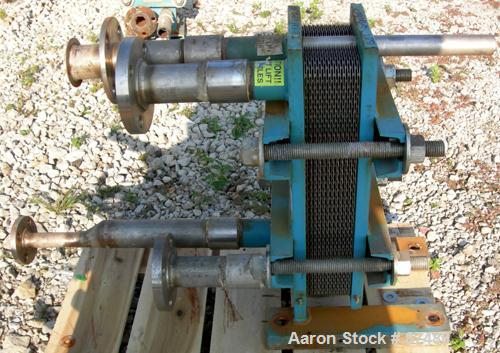 USED: Tranter Superchanger plate heat exchanger, model UX-056-UJ-24, 14 square feet, 316 stainless steel. (24) Approximately 8" wide x 20" long plates, rated 130 psi at 300 deg F. (4) 2-1/2" inlets/o...