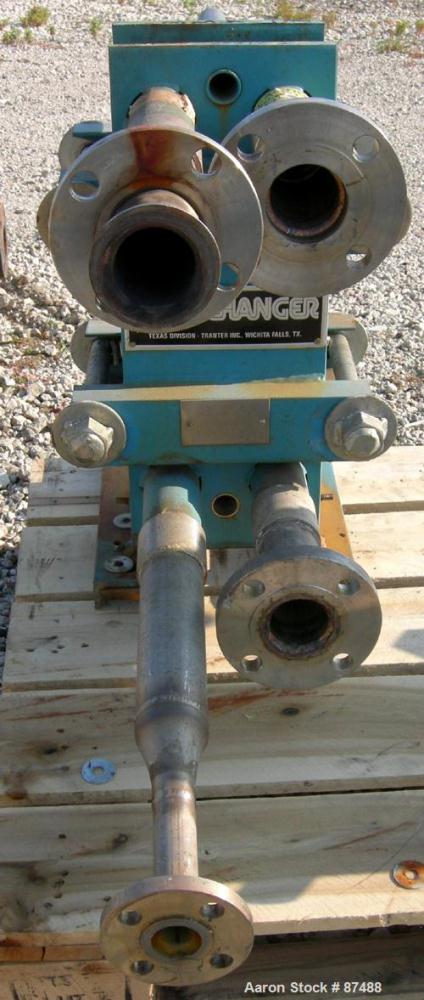 USED: Tranter Superchanger plate heat exchanger, model UX-056-UJ-24, 14 square feet, 316 stainless steel. (24) Approximately 8" wide x 20" long plates, rated 130 psi at 300 deg F. (4) 2-1/2" inlets/o...