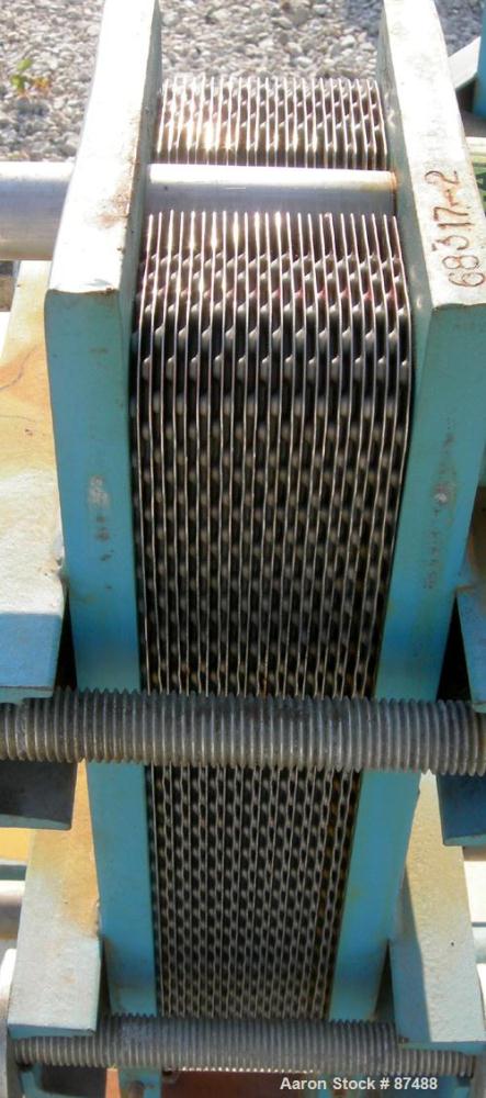 USED: Tranter Superchanger plate heat exchanger, model UX-056-UJ-24, 14 square feet, 316 stainless steel. (24) Approximately...