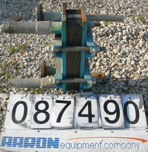 USED: Tranter Superchanger plate heat exchanger, model UX-056-UJ-26, 15.2 square feet, 304 stainless steel. (26) Approximately 8" wide x 20" long plates, rated 130 psi at 300 deg F. (4) 2" inlets/out...
