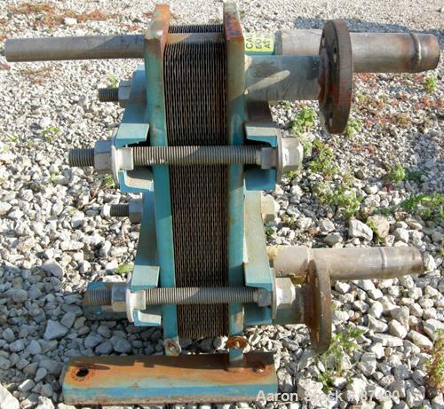 USED: Tranter Superchanger plate heat exchanger, model UX-056-UJ-26, 15.2 square feet, 304 stainless steel. (26) Approximately 8" wide x 20" long plates, rated 130 psi at 300 deg F. (4) 2" inlets/out...