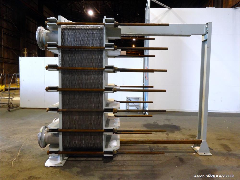 Used Tranter Superchanger Plate Heat Exchanger, Approximate 3421.8 Square Feet Surface Area, Model UX-896-UP-189. Approximate (139) 40" wide x 92" tall 316 stainless steel plates rated 125 psi at 38 ...
