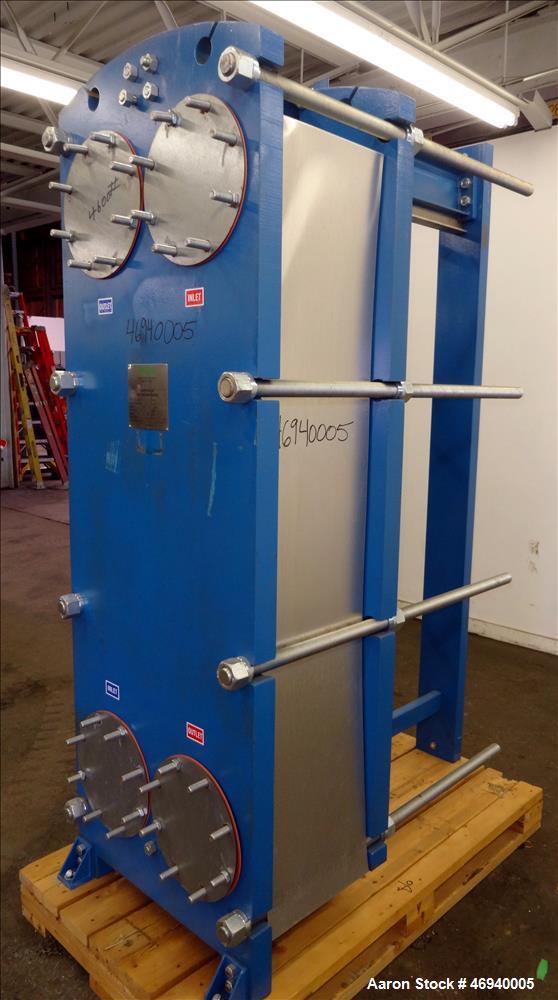 Unused- WCR Incorporated Plate Heat Exchanger, Model WCR-A891M, 741.1 Square Feet, 316 Stainless Steel, Vertical. (42) Approximate 15" wide x 67" long plates rated hot/cold sides 150 psi at -50 to 26...