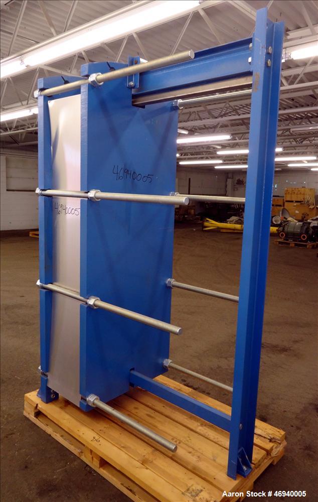 Unused- WCR Incorporated Plate Heat Exchanger, Model WCR-A891M, 741.1 Square Feet, 316 Stainless Steel, Vertical. (42) Approximate 15" wide x 67" long plates rated hot/cold sides 150 psi at -50 to 26...