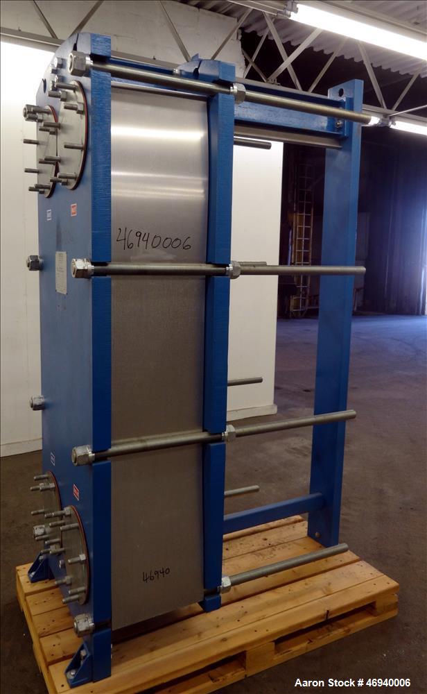 Unused- WCR Incorporated Plate Heat Exchanger, Model WCR-A891M, 741.1 Square Feet, 316 Stainless Steel, Vertical. (83) Approximate 15" wide x 67" long plates rated hot/cold sides 150 psi at -50 to 26...