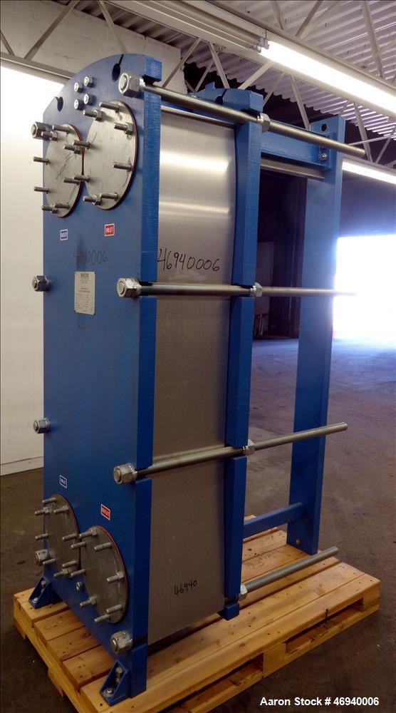 Unused- WCR Incorporated Plate Heat Exchanger, Model WCR-A891M, 741.1 Square Feet, 316 Stainless Steel, Vertical. (83) Approximate 15" wide x 67" long plates rated hot/cold sides 150 psi at -50 to 26...