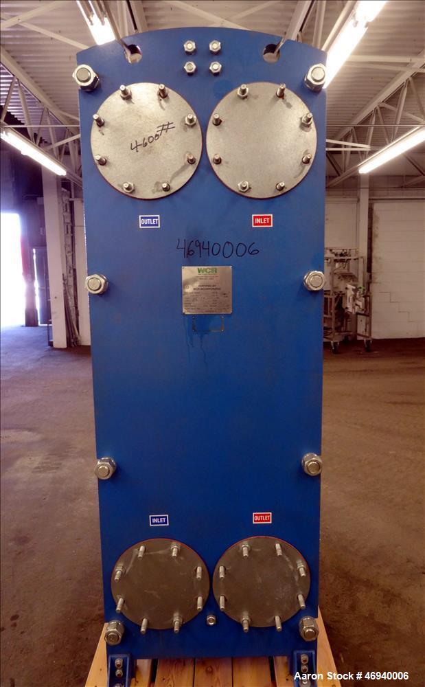 Unused- WCR Incorporated Plate Heat Exchanger, Model WCR-A891M, 741.1 Square Feet, 316 Stainless Steel, Vertical. (83) Approximate 15" wide x 67" long plates rated hot/cold sides 150 psi at -50 to 26...