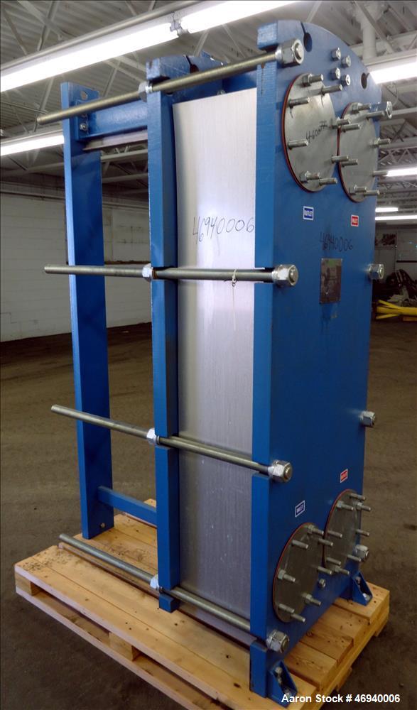 Unused- WCR Incorporated Plate Heat Exchanger, Model WCR-A891M, 741.1 Square Feet, 316 Stainless Steel, Vertical. (83) Approximate 15" wide x 67" long plates rated hot/cold sides 150 psi at -50 to 26...