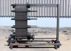 Used- APV Creapco Plate Heat Exchanger, Model R56-T, Approximate 565 Square Feet, Vertical. (85) 316 Stainless steel plates,...