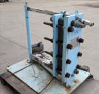 Used Stainless Steel APV Plate Heat Exchanger, Model HXU-8, Approximately 19 Sq