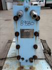 Used Stainless Steel APV Plate Heat Exchanger, Model HXU-8, Approximately 19 Sq