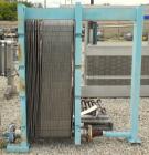Used APV Plate Heat Exchanger, Approximately 878 Square Feet, Model R57, 316 Stainless Steel. (61) 16