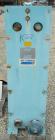 Used APV Plate Heat Exchanger, Approximately 878 Square Feet, Model R57, 316 Stainless Steel. (61) 16