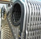 Used APV Plate Heat Exchanger, Approximately 878 Square Feet, Model R57, 316 Stainless Steel. (61) 16