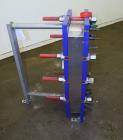 Unused- Alfa Laval Plate Exchanger, 87.83 Square Feet, Model M10-BDFG. (36) 120 mm thick 316 stainless steel plates. Designed 150 psi at -20 to 212 degrees F. (4) 3