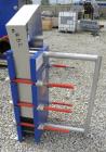 Used Alfa Laval Thermal Plate Exchanger, 116.2 Square Feet, Model M10-BFG. (47) Approximately 14-1/2 wide x 34-1/2 tall x 0.50 mm thick commercially pure titanium plates. Designed 150 psi at 20 to 22...
