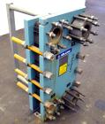 Used Alfa Laval Plate Exchanger, Approximate 84 Square Feet, Model M10-BWFD. (34) Approximately 14-3/4” wide x 34” tall Titanium plates. Rated 10 bar (145 psi) at 10 degrees C. (50 F.). (4) 3-3/4” In...
