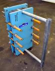 Used Alfa Laval Plate Exchanger, Approximate 84 Square Feet, Model M10-BWFD. (34) Approximately 14-3/4” wide x 34” tall Titanium plates. Rated 10 bar (145 psi) at 10 degrees C. (50 F.). (4) 3-3/4” In...