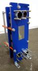 Unused- Alfa Laval Plate Exchanger, 61.35 Square Feet (5.7 Square Meters), Model M6-FG. (40) 316 Stainless steel plates. Designed 10 bar (145 psi) at 60 degrees C (140 F). (2) Inlets, (2) outlets. Mo...