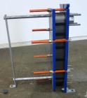 Unused- Alfa Laval Plate Exchanger, 61.35 Square Feet (5.7 Square Meters), Model M6-FG. (40) 316 Stainless steel plates. Designed 10 bar (145 psi) at 60 degrees C (140 F). (2) Inlets, (2) outlets. Mo...