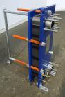 Unused- Alfa Laval Plate Exchanger, 61.35 Square Feet (5.7 Square Meters), Model M6-FG. (40) 316 Stainless steel plates. Designed 10 bar (145 psi) at 60 degrees C (140 F). (2) Inlets, (2) outlets. Mo...