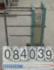 Used Alfa Laval Plate Heat Exchanger, model M6-MDFG, 316 stainless steel, 48 square feet. Maximum flow rate 3.52 gallons per minute. (32) Approximate 12