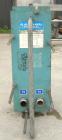 Used Alfa Laval Plate Heat Exchanger, model M6-MDFG, 316 stainless steel, 48 square feet. Maximum flow rate 3.52 gallons per minute. (32) Approximate 12