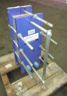Unused- Alfa Laval Plate Exchanger, Model M6-MFD, 84.4 Square Feet.  (58) 0.60 mm Thick 316 stainless steel plates. Designed 300 psi at -20 to 250 degrees F. (2) 2